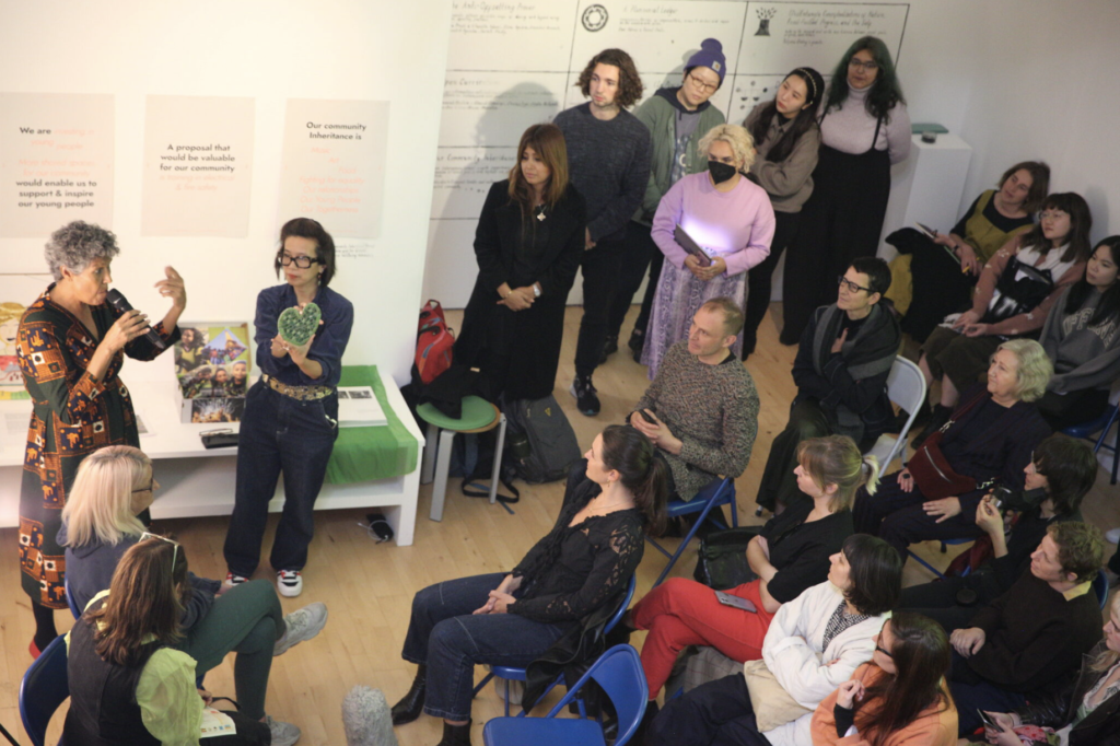 Cecilia Wee and Moyra Samuels present to the audience, Sunlight Doesn't Need a Pipeline Community Festival, Stanley Picker Gallery.
